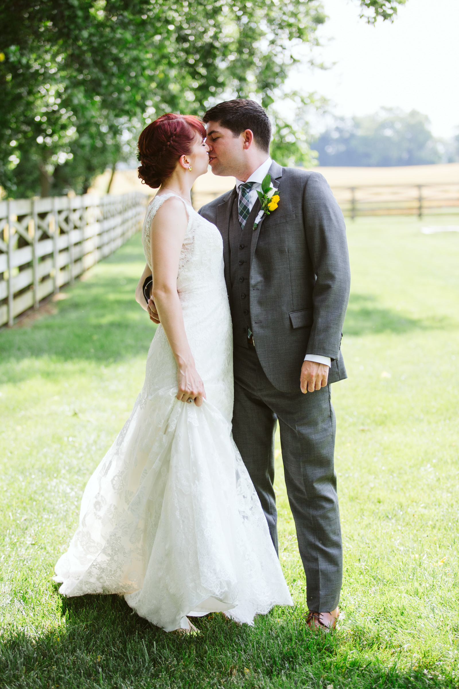 Bride and groom kiss at Walkers Overlook wedding in Walkersville Maryland