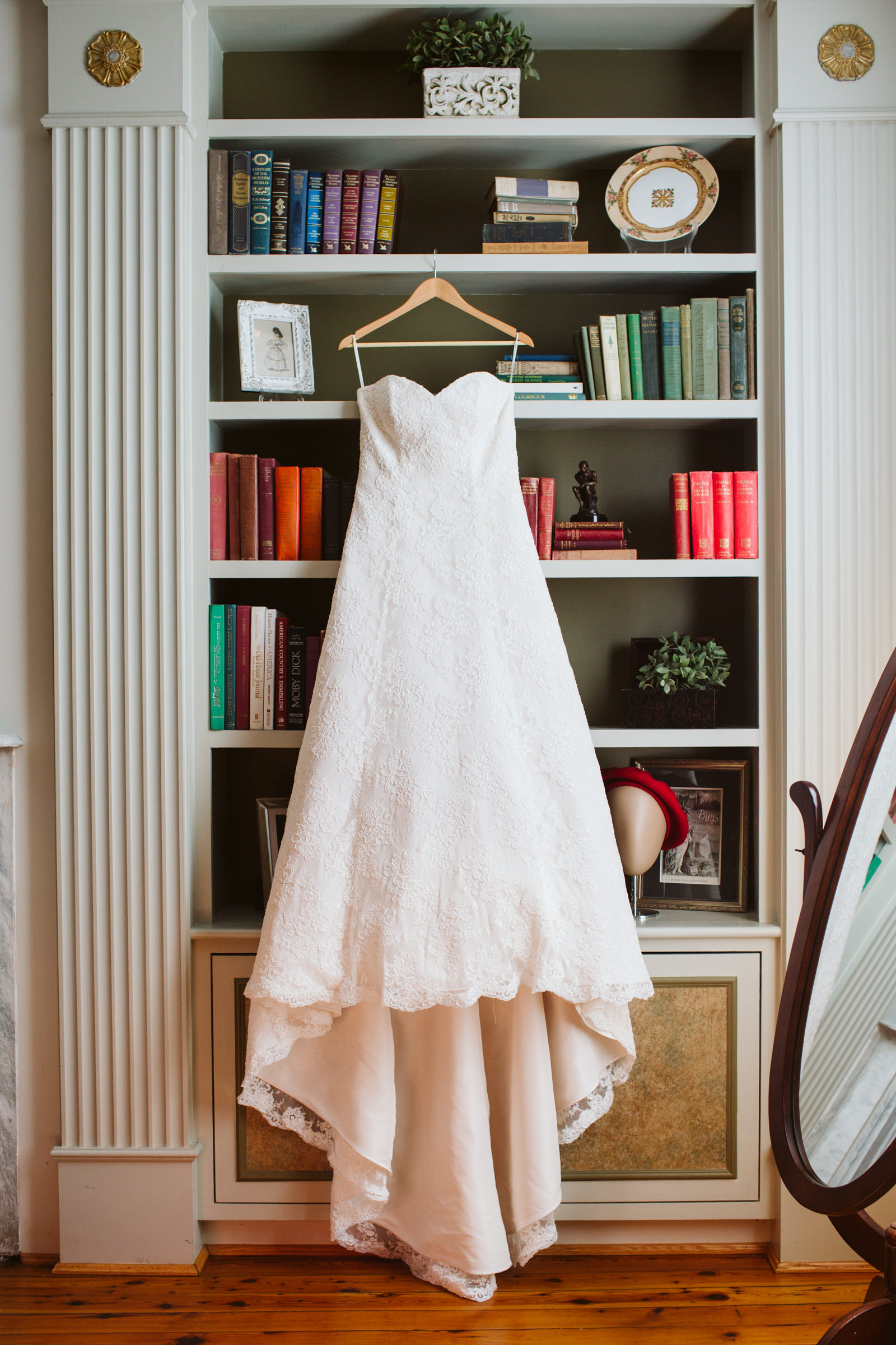 Photo of dress hanging on bookcase at Whitehall Estate in Bluemont Virginia