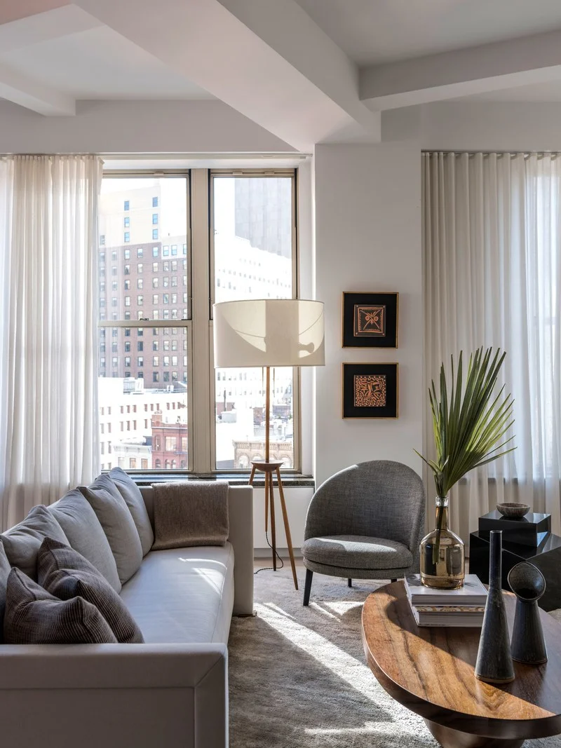 Ann's stoneware vases featured on coffee table in foreground. Photo: Fran Parente