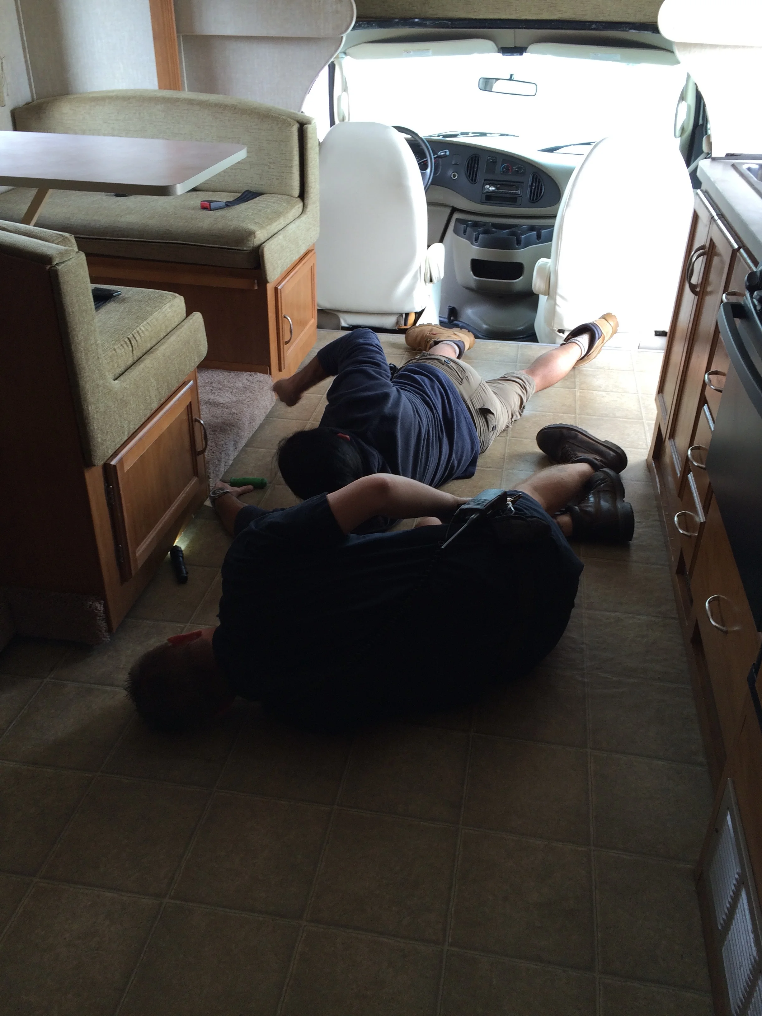 El Monte General Manager and service tech working on the slide-out: Day One.