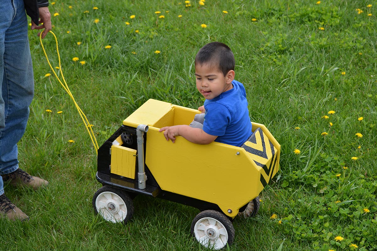 Checking out the new dump truck Papa S. made him.