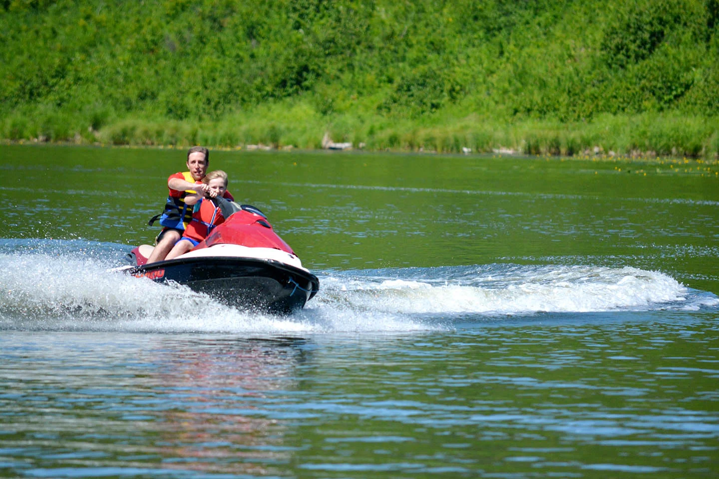 Showing the kiddo how to jetski.