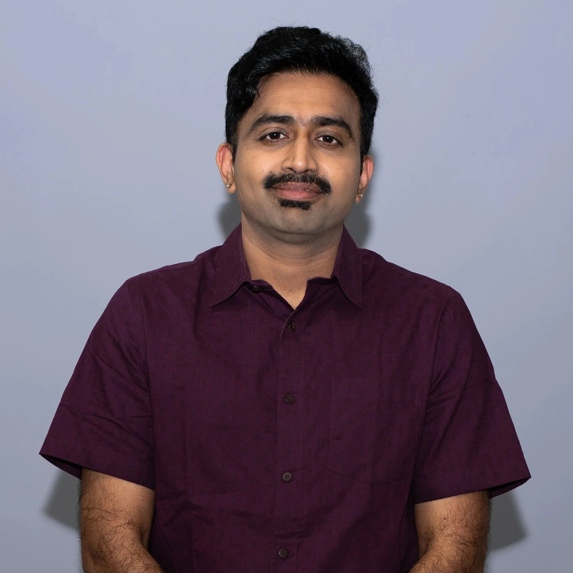 Kartic Bhargav as ARUMUGAM