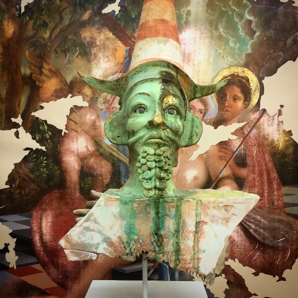 Peter Daverington, Jonathan (installation detail with painting in background), 2014, styrofoam, epoxy clay, wire mesh, gold leaf, plaster, resin, glass eye, enamel, pigments, 76 x 40.5 x 30.5 cm 