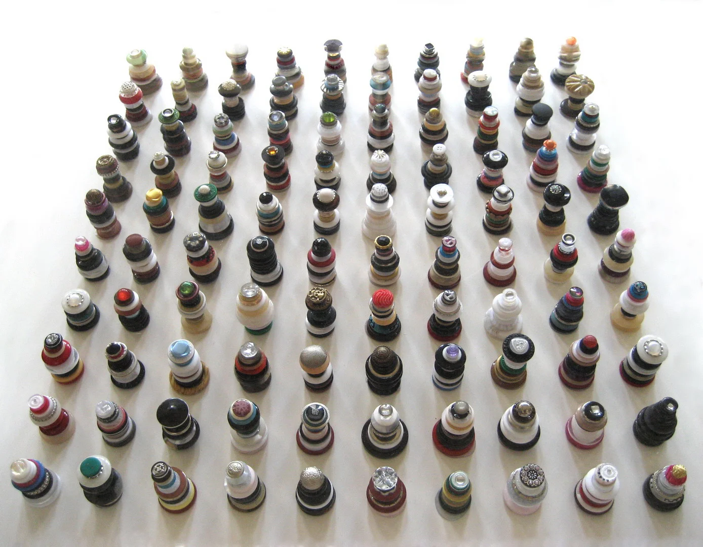   One hundred Pagodas , 2014, Buttons, perspex, 60 x 60 cm 