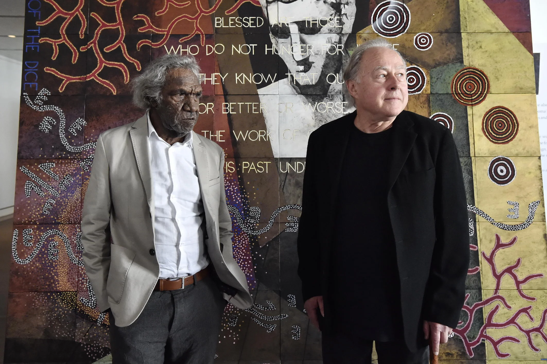 Image: Michael Nelson Jagamara and Imants Tillers unveiling The Messenger at Parliament House, Canberra. Photographs: DPS/Auspic.