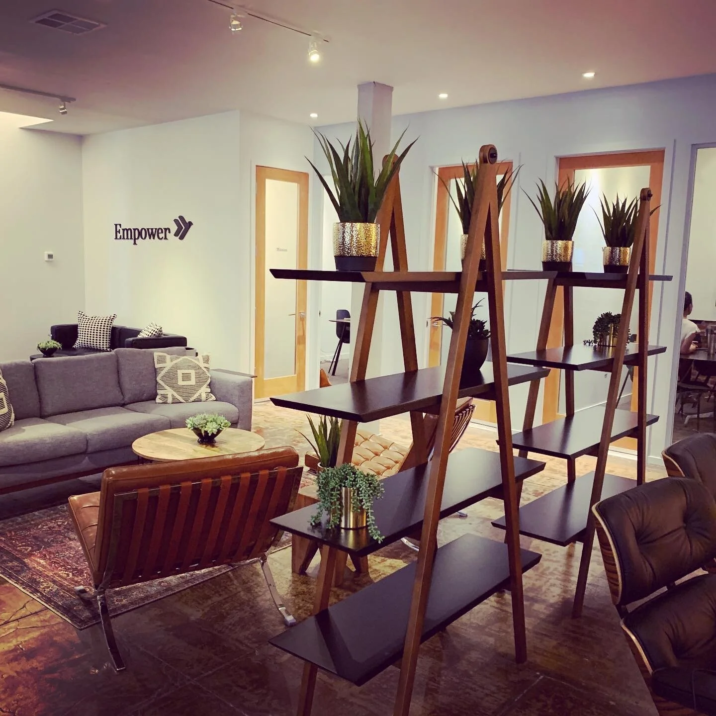   They needed help executing their ideas, sourcing the furniture, and bringing their vision to life within their budget. I loved the industrial aesthetic of this project because it is so different from traditional banking companies.”  