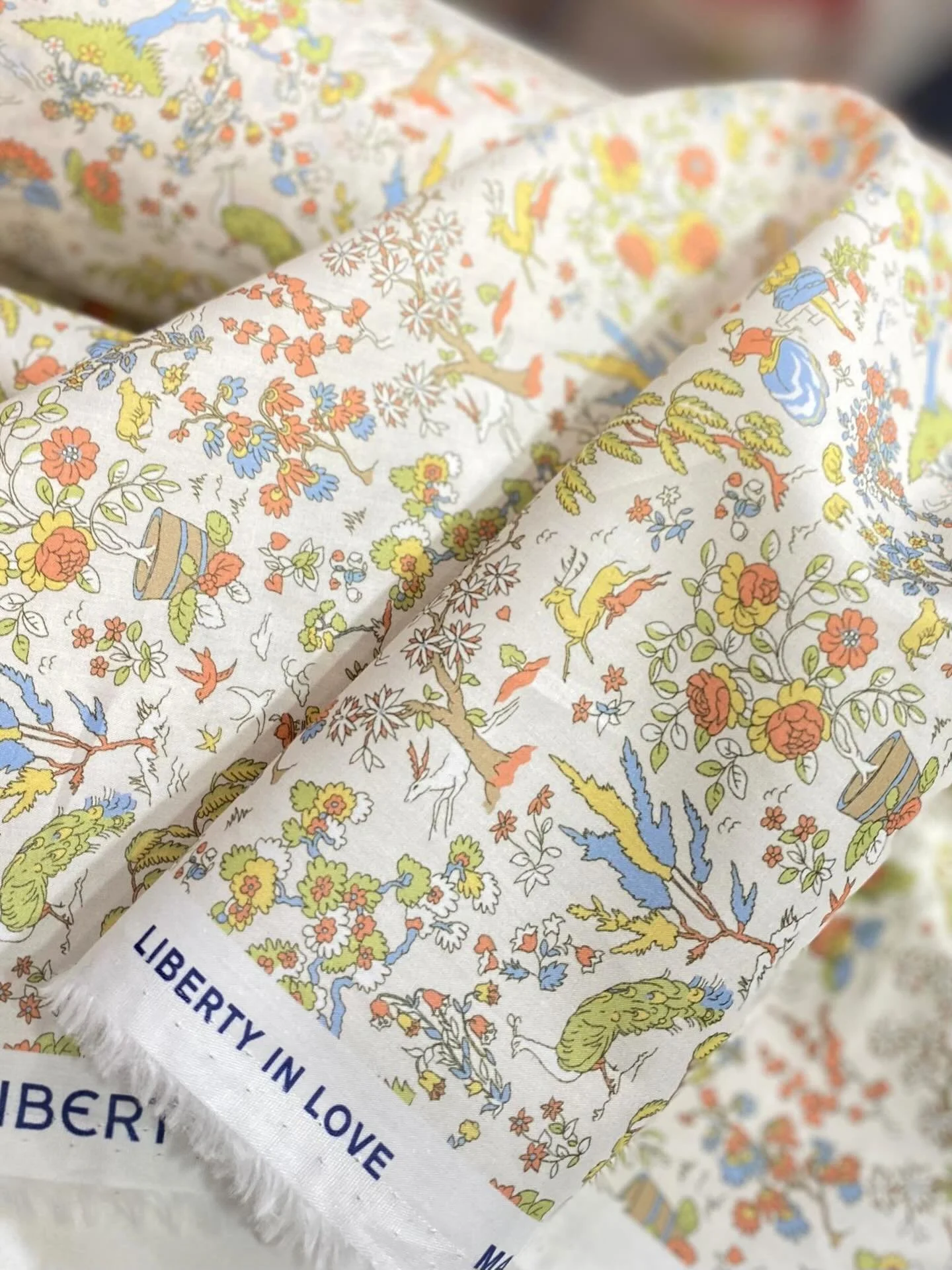 Reimagined as a picturesque landscape tableau, Liddel Garden unveils romantic rural scenes dancing ladies, pastoral musicians, blossoming trees, leaping stags, and proud peacocks &mdash; an idyllic, folk-inspired design beautifully capturing the joyf