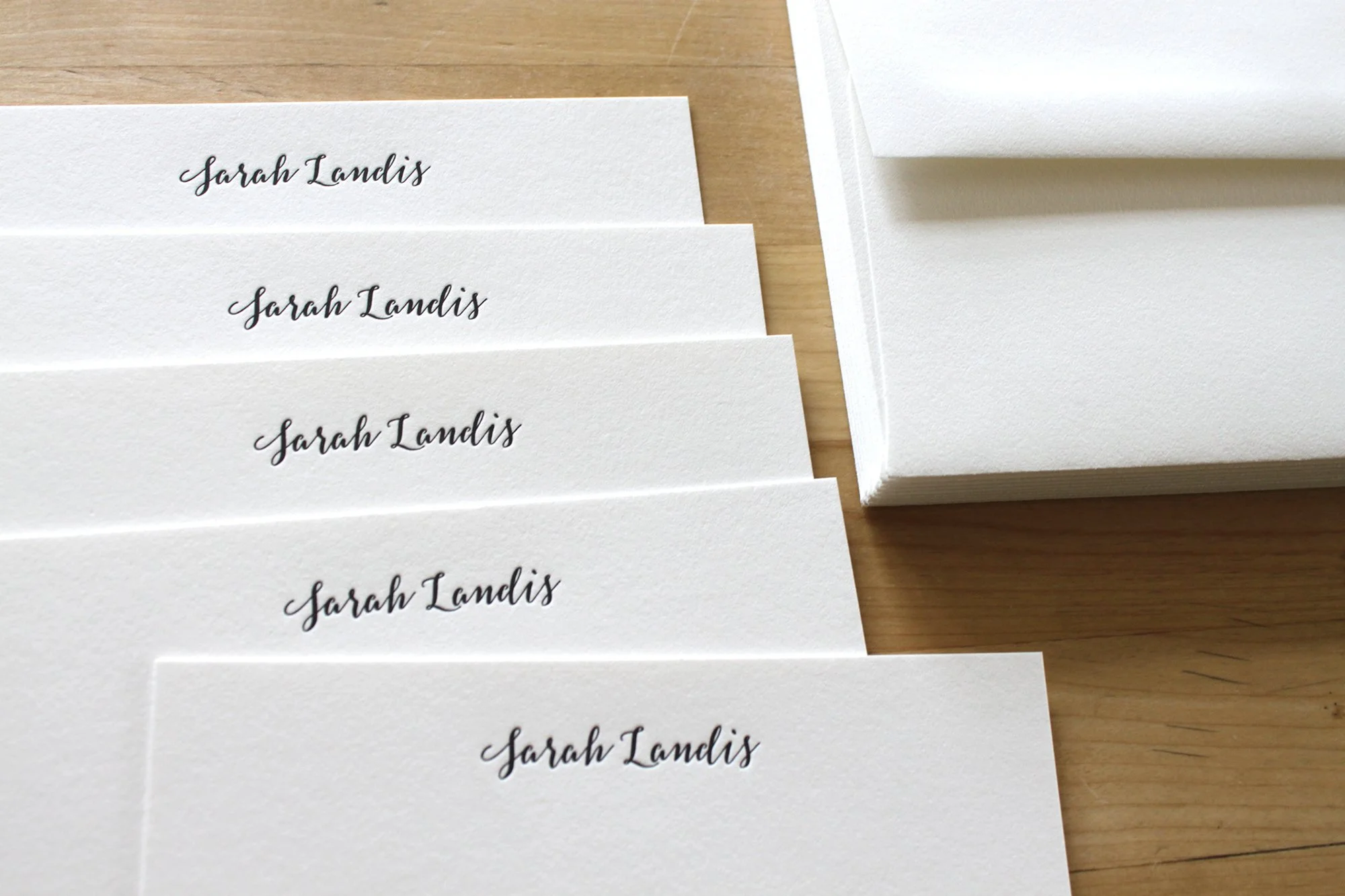 Custom letterpress stationery with handwritten-style script font on white cotton paper – personalized stationery set by Moontree Letterpress.