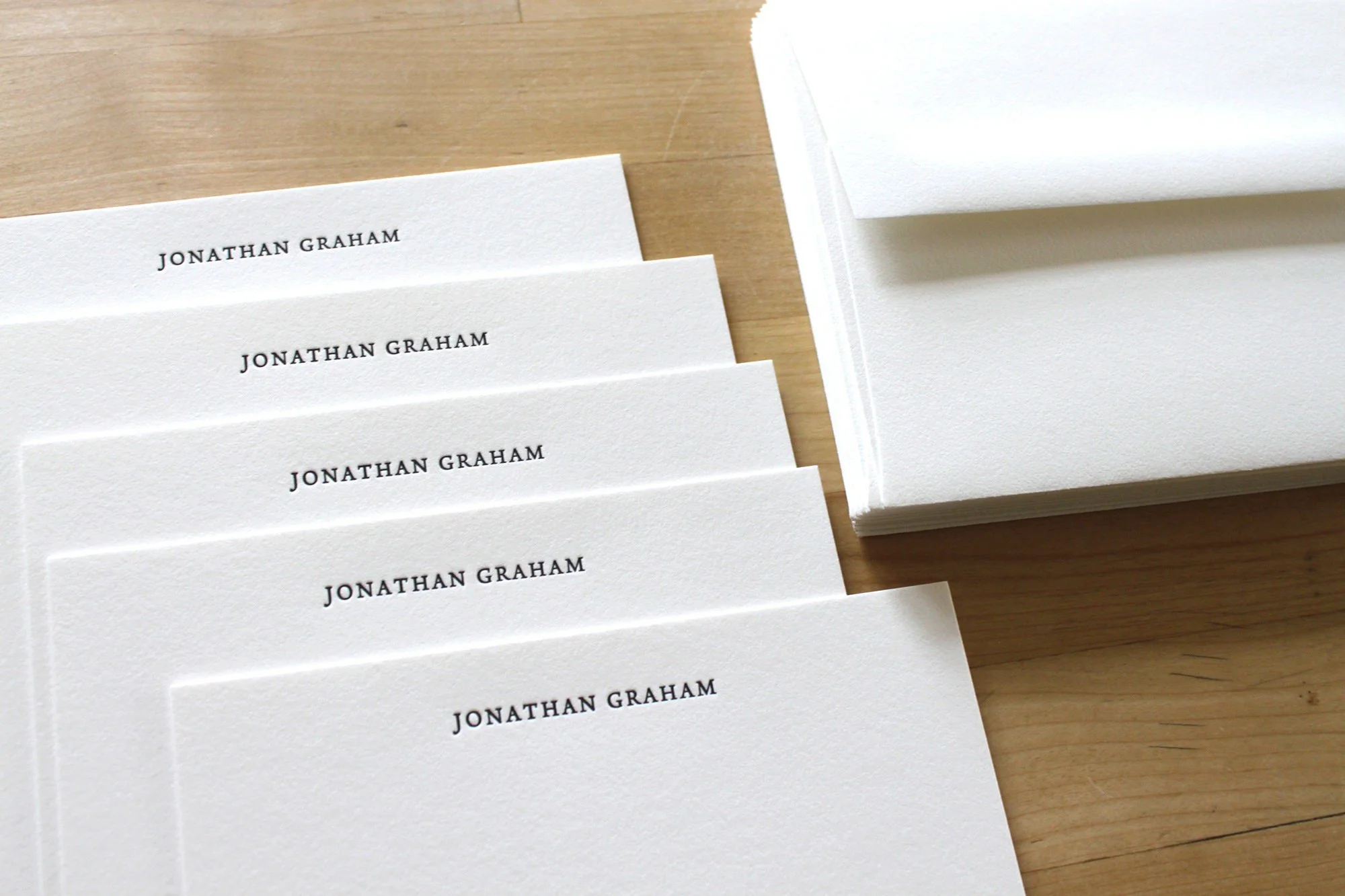 Personalized letterpress stationery with name printed in classic black ink on thick white cotton paper – handcrafted stationery by Moontree Letterpress.