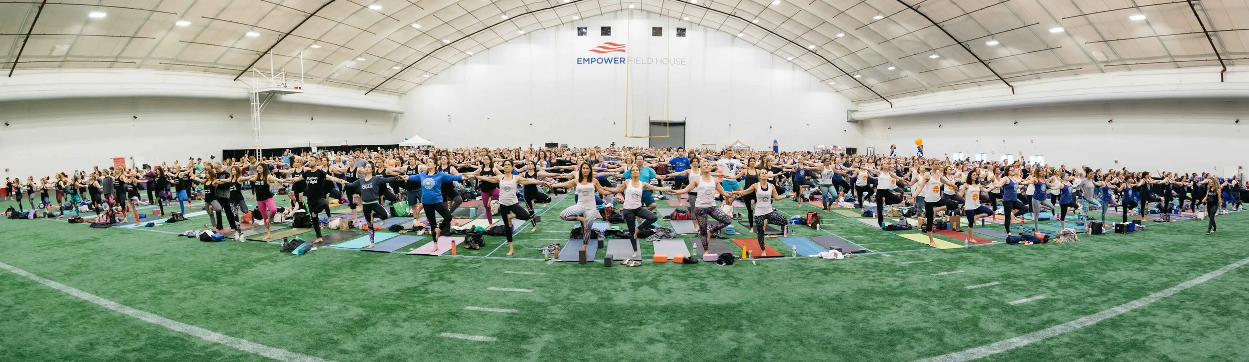 Over 900 yogis linked arm in arm to support Boston Children's Hospital Wellness Center.