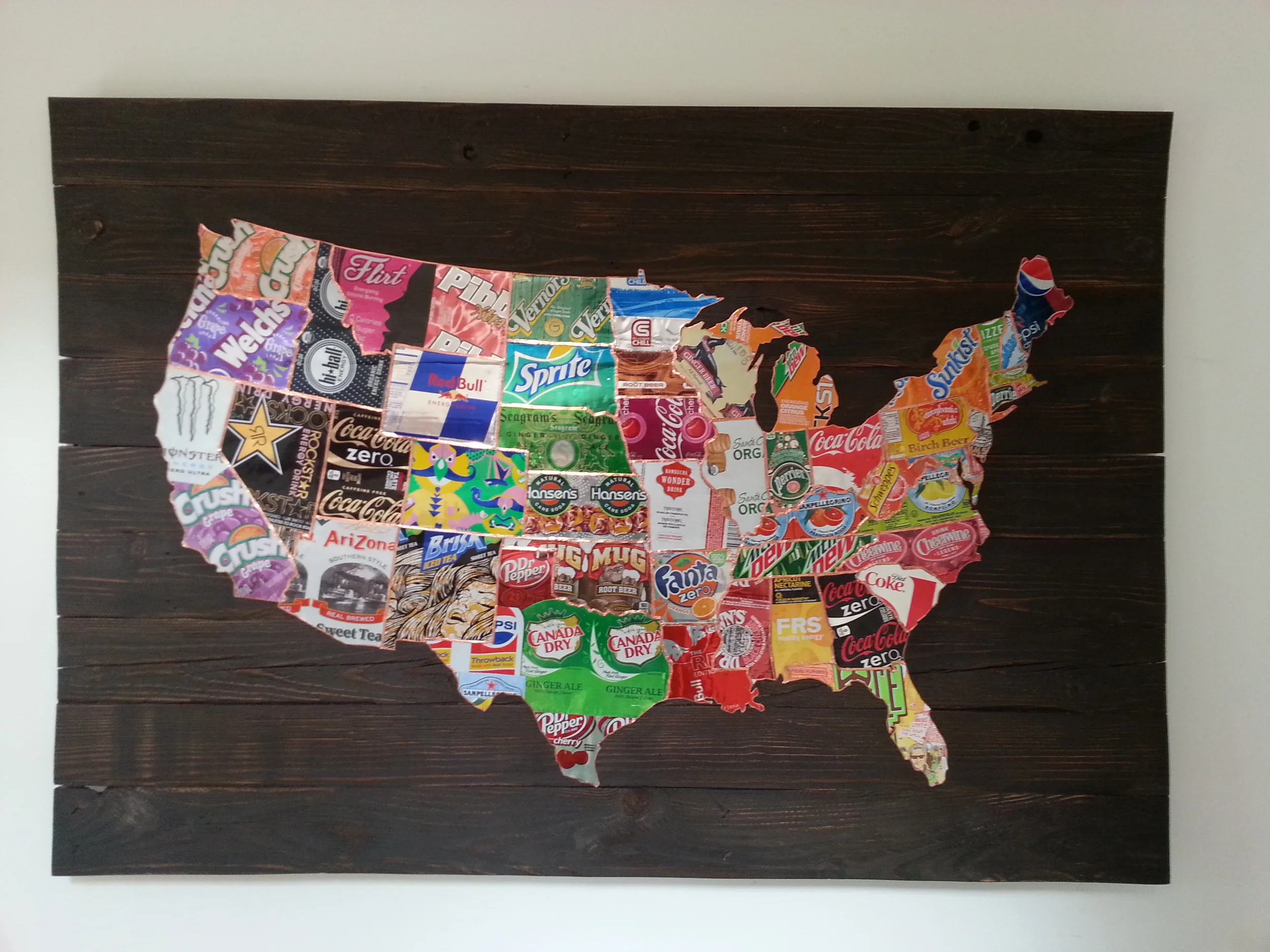  49" w x 33" h aluminum cans and copper on reclaimed wood 