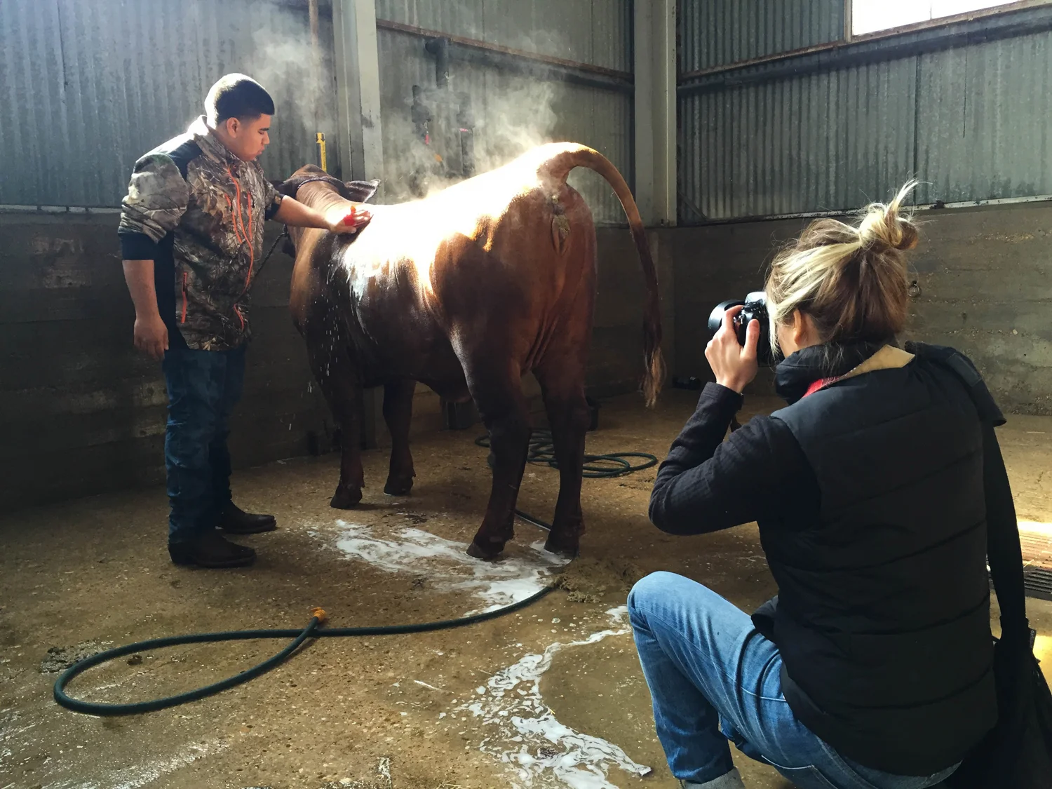 Me, wet and miserable, desperately trying to get "the shot" and do my mentor Jan Garcia proud! (Photo by Jan Garcia)