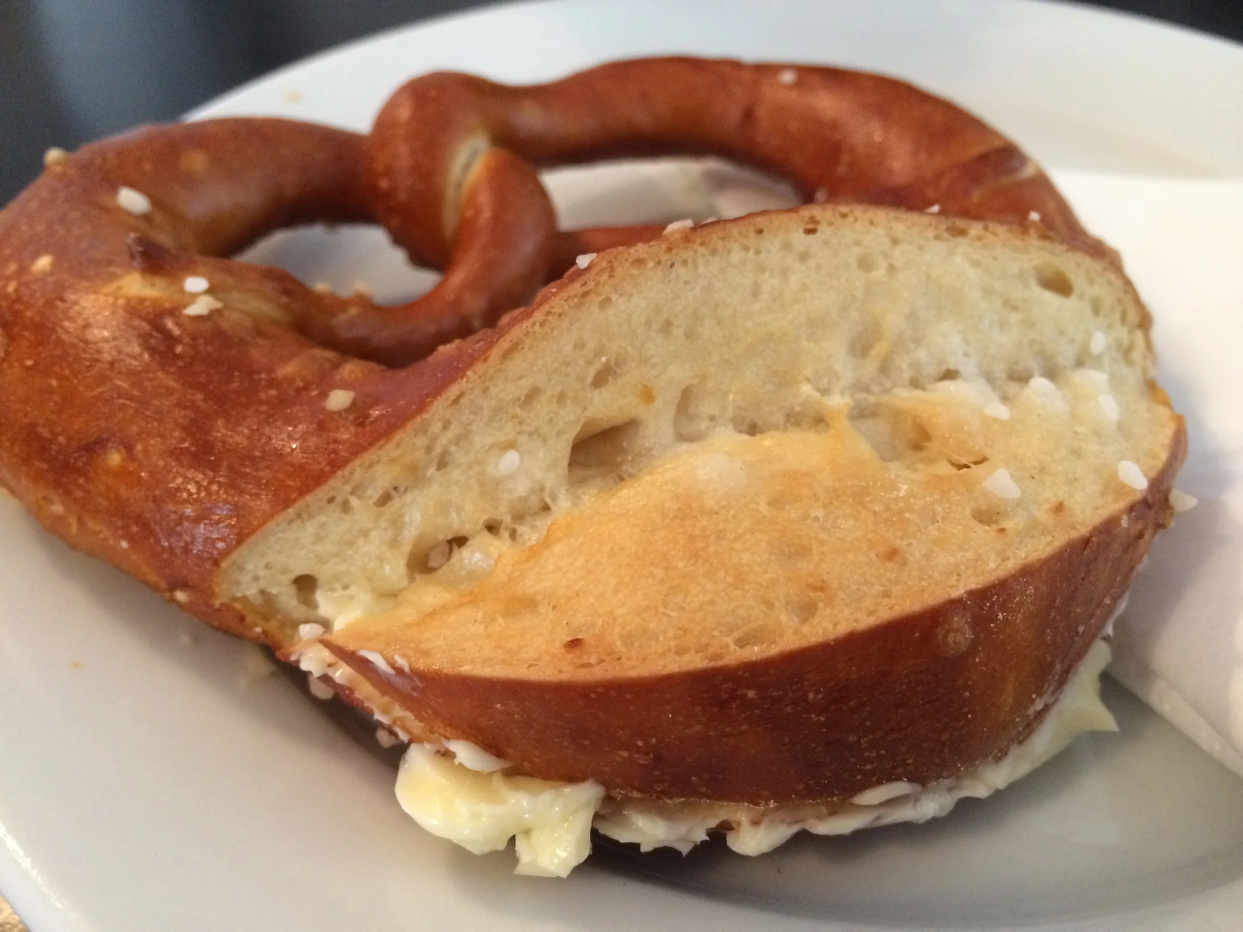 Freshly baked buttered pretzel.