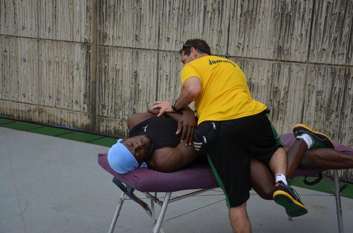 Usain Bolt having a Chiropractic Adjustment