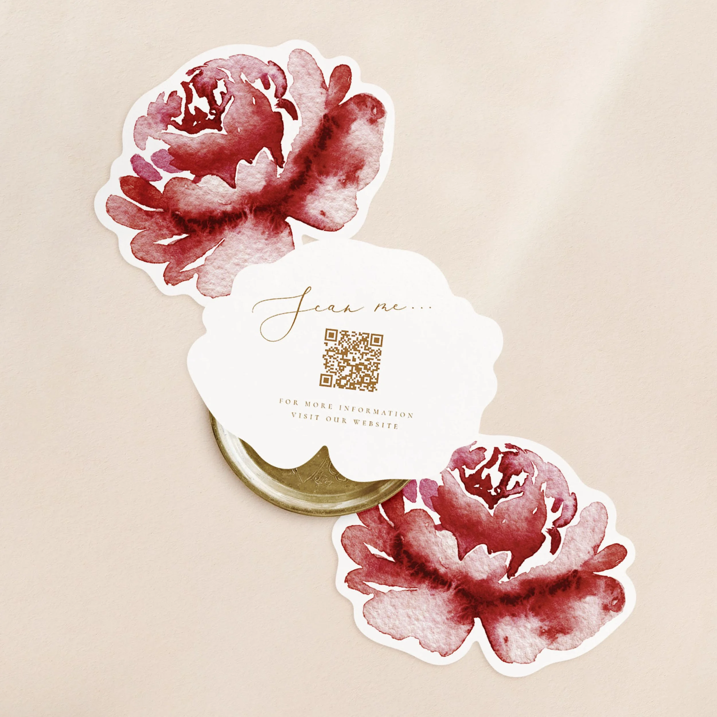Three flower shaped cards with a burgundy watercolour flower on one side and a qr code printed in gold text on the other.