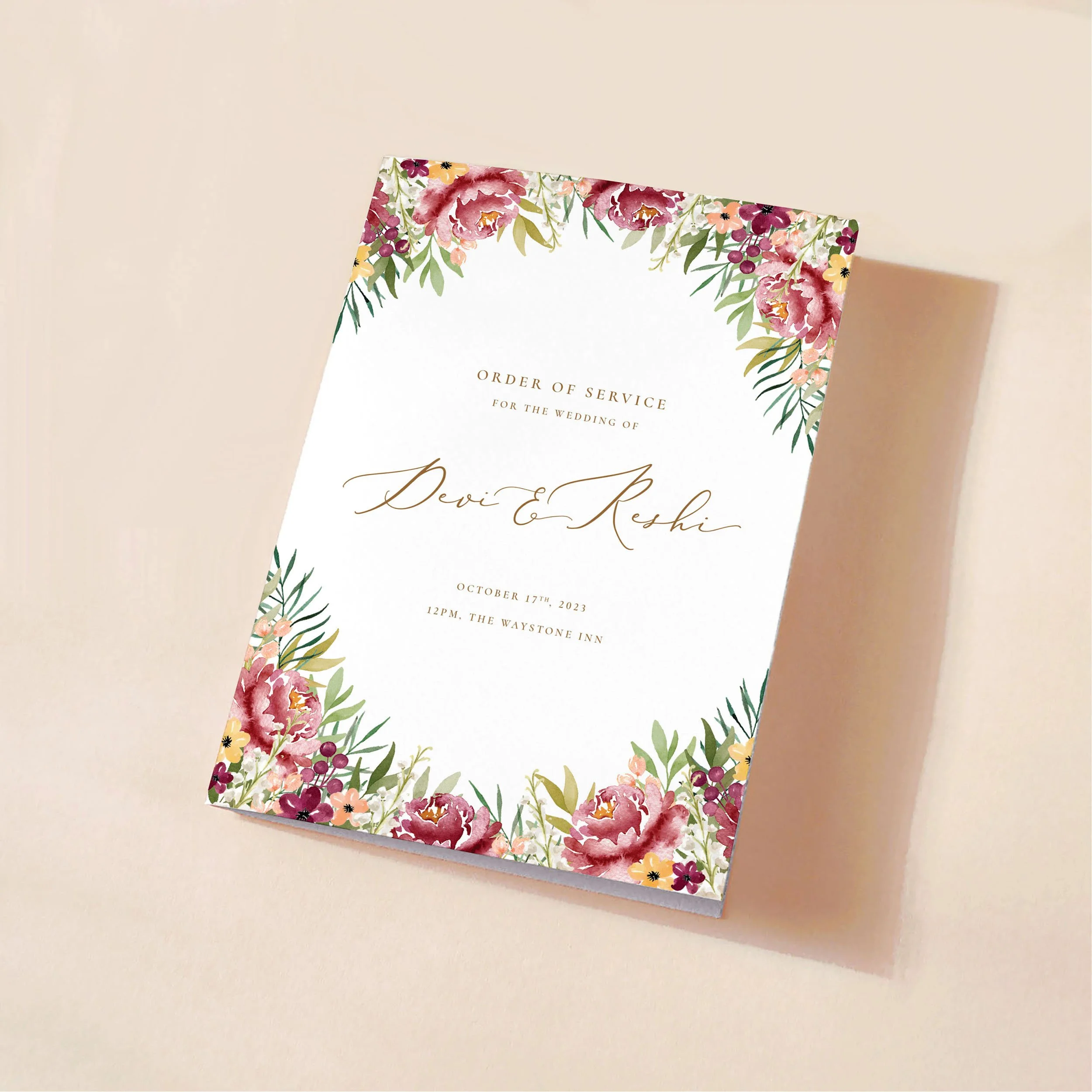 Cover of an order of service booklet with soft green leaves and burgundy watercolour flowers