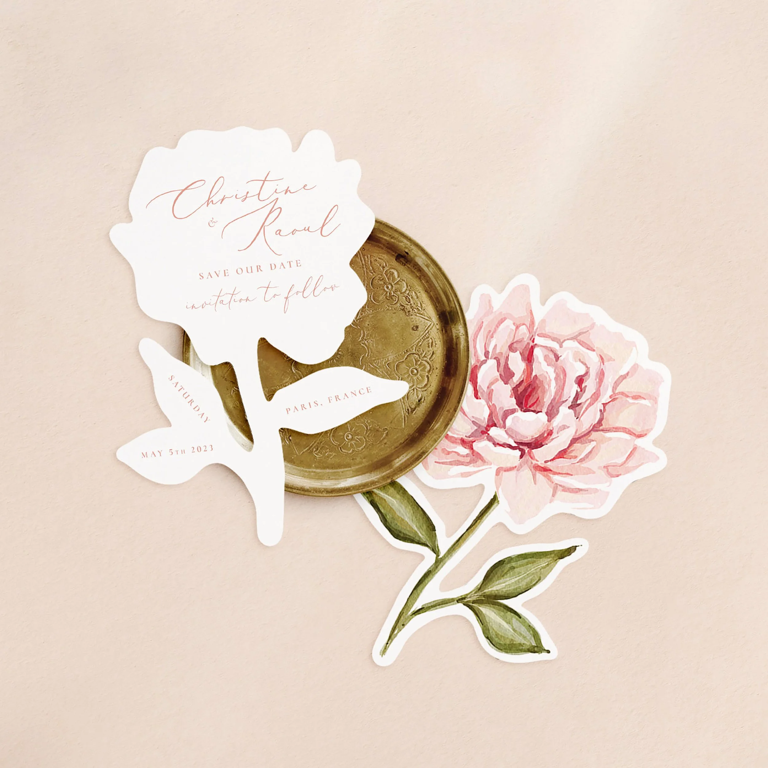 Two flower-shaped cards with a hand-painted peony on one side and wedding save the date wording in pink text on the other.