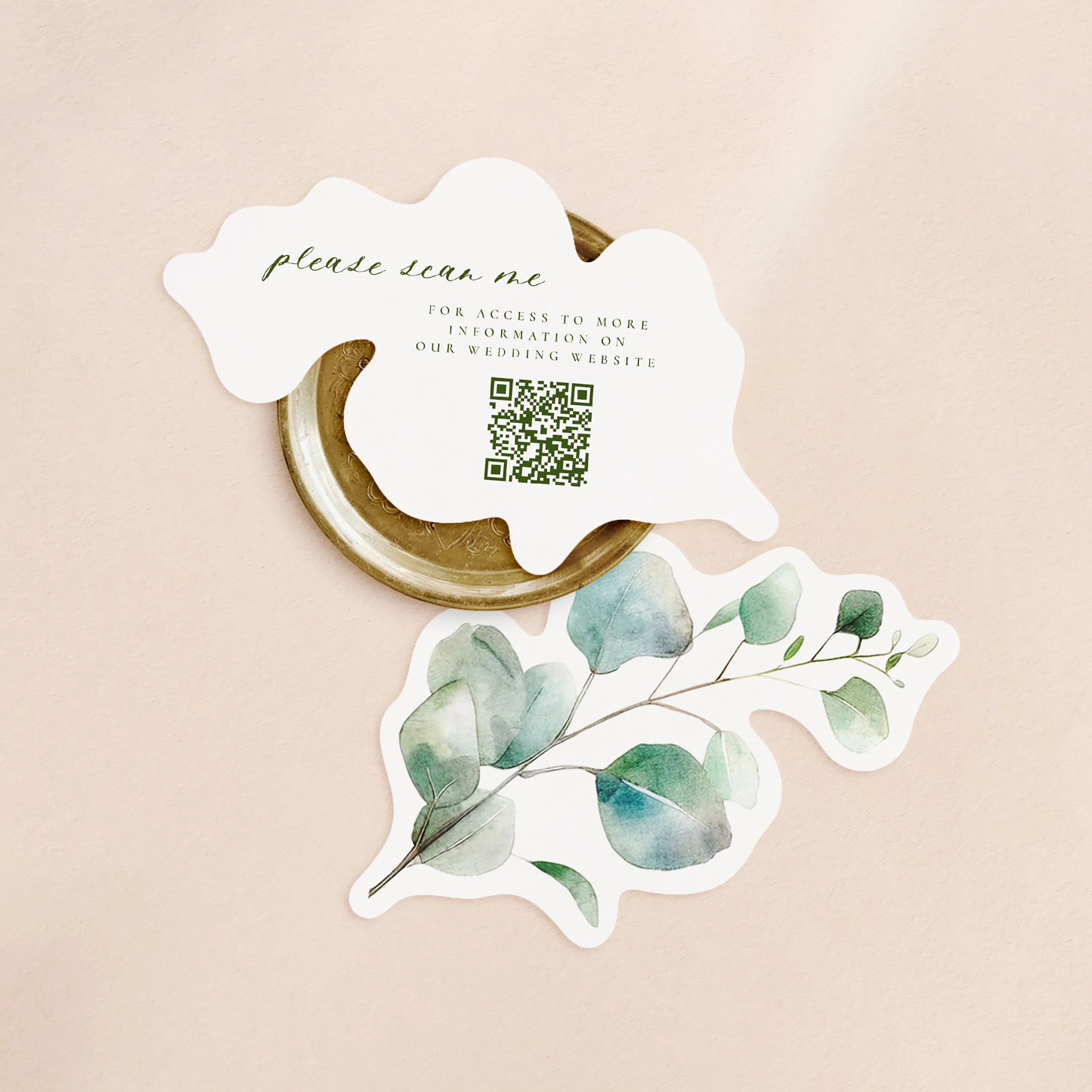 Three eucalyptus shaped cards with a qr codes printed on each in green text.