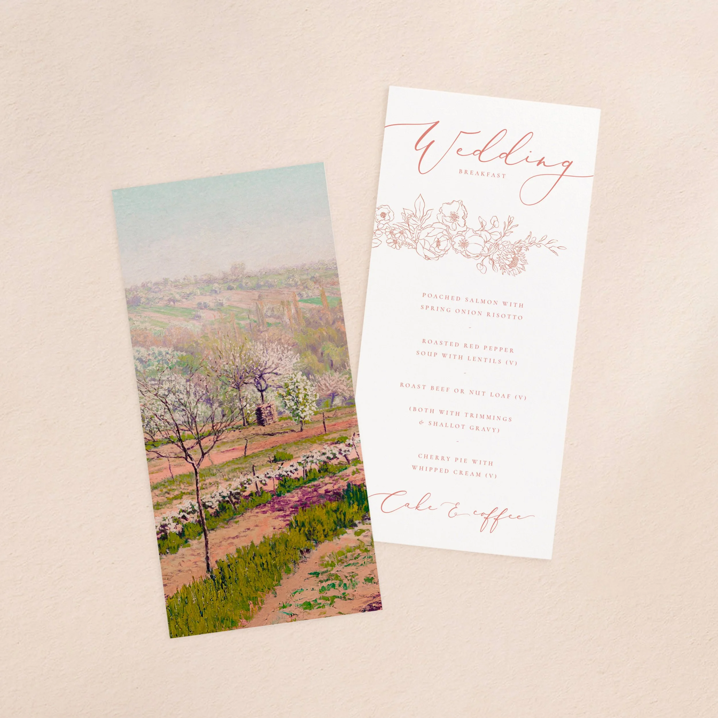 A wedding menu card and vellum paper overlay sheet with a printed pink and green landscape painting design.