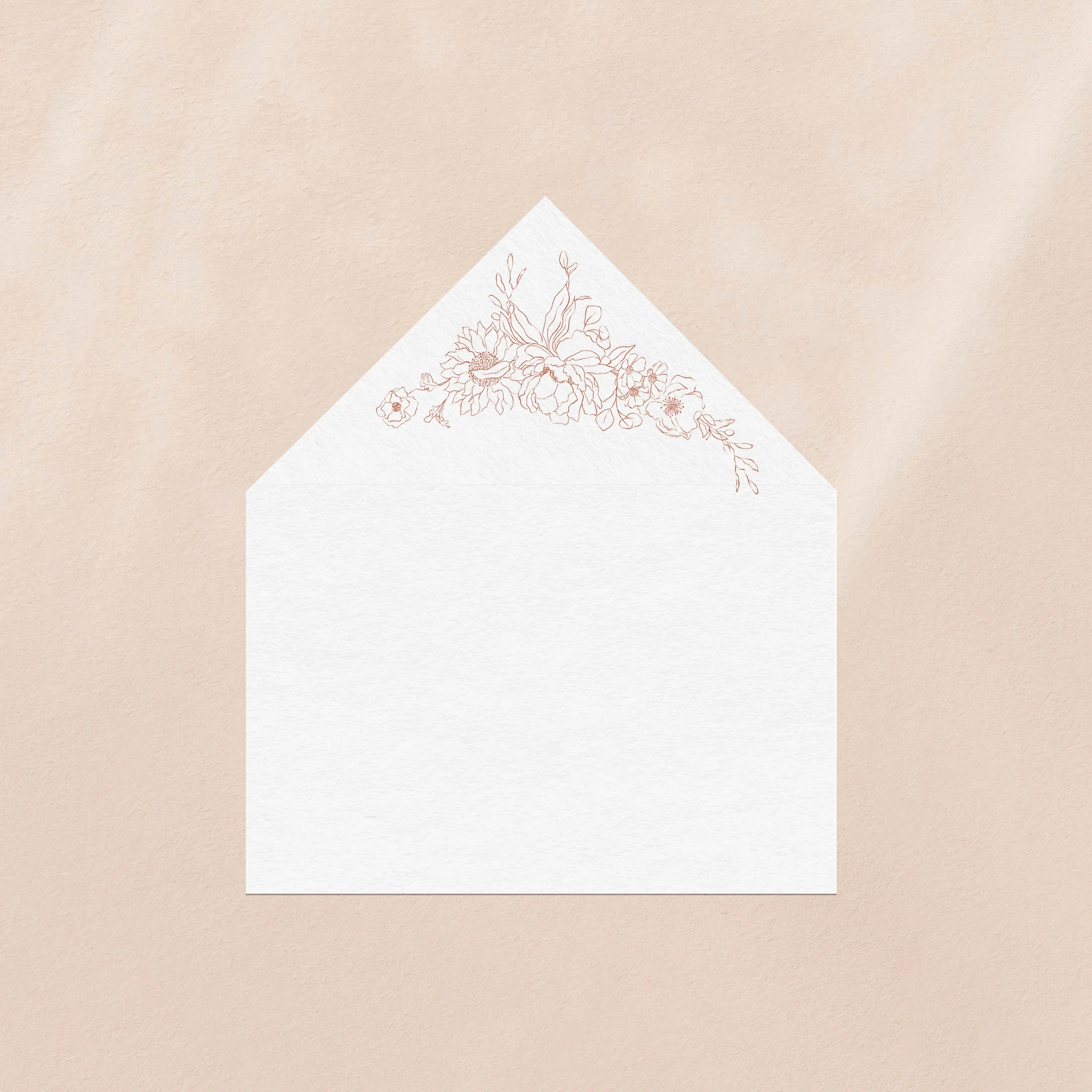 An envelope liner with a delicate pink motif design