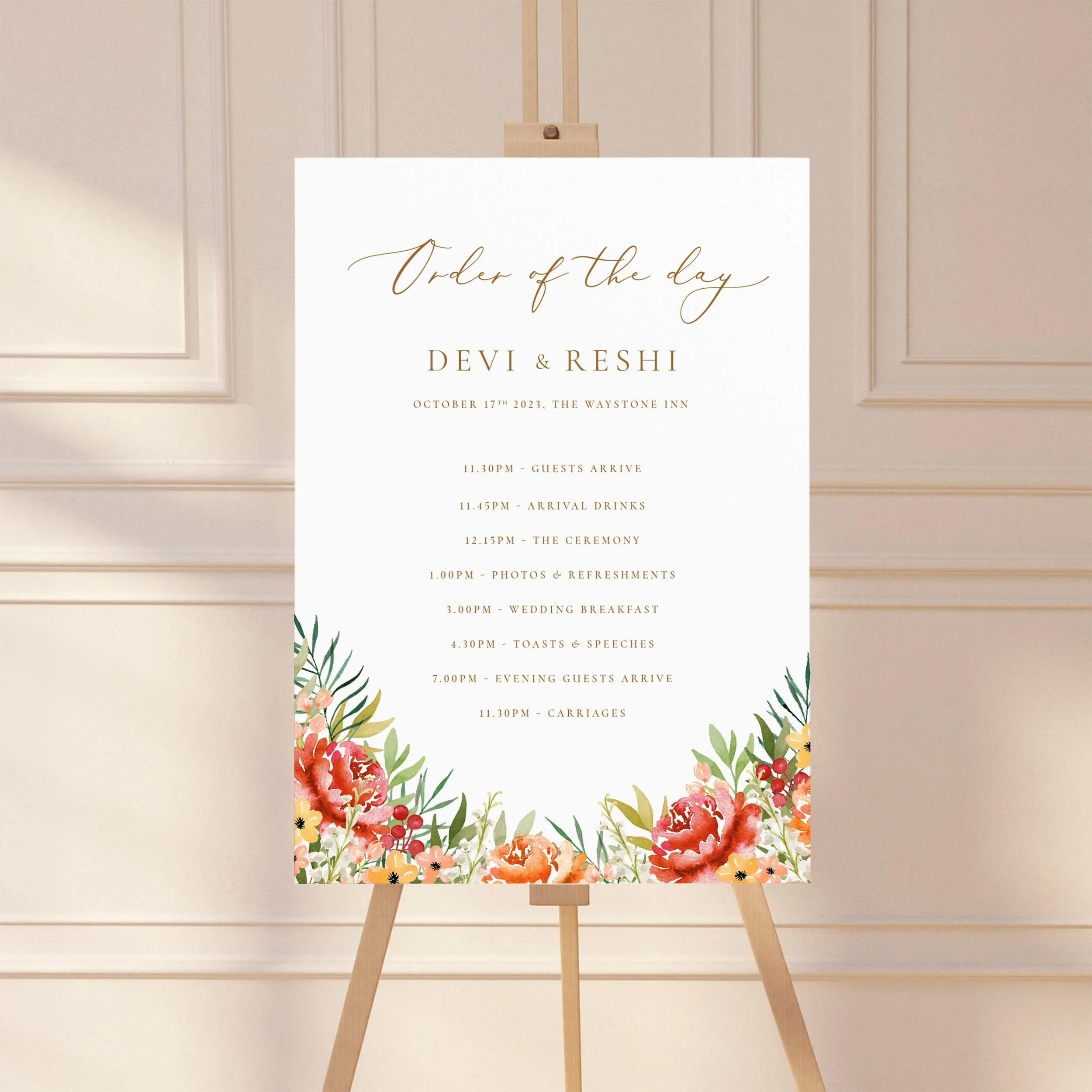 Large sign on an easel displaying a wedding order of the day timeline, featuring a floral burgundy and orange autumn design