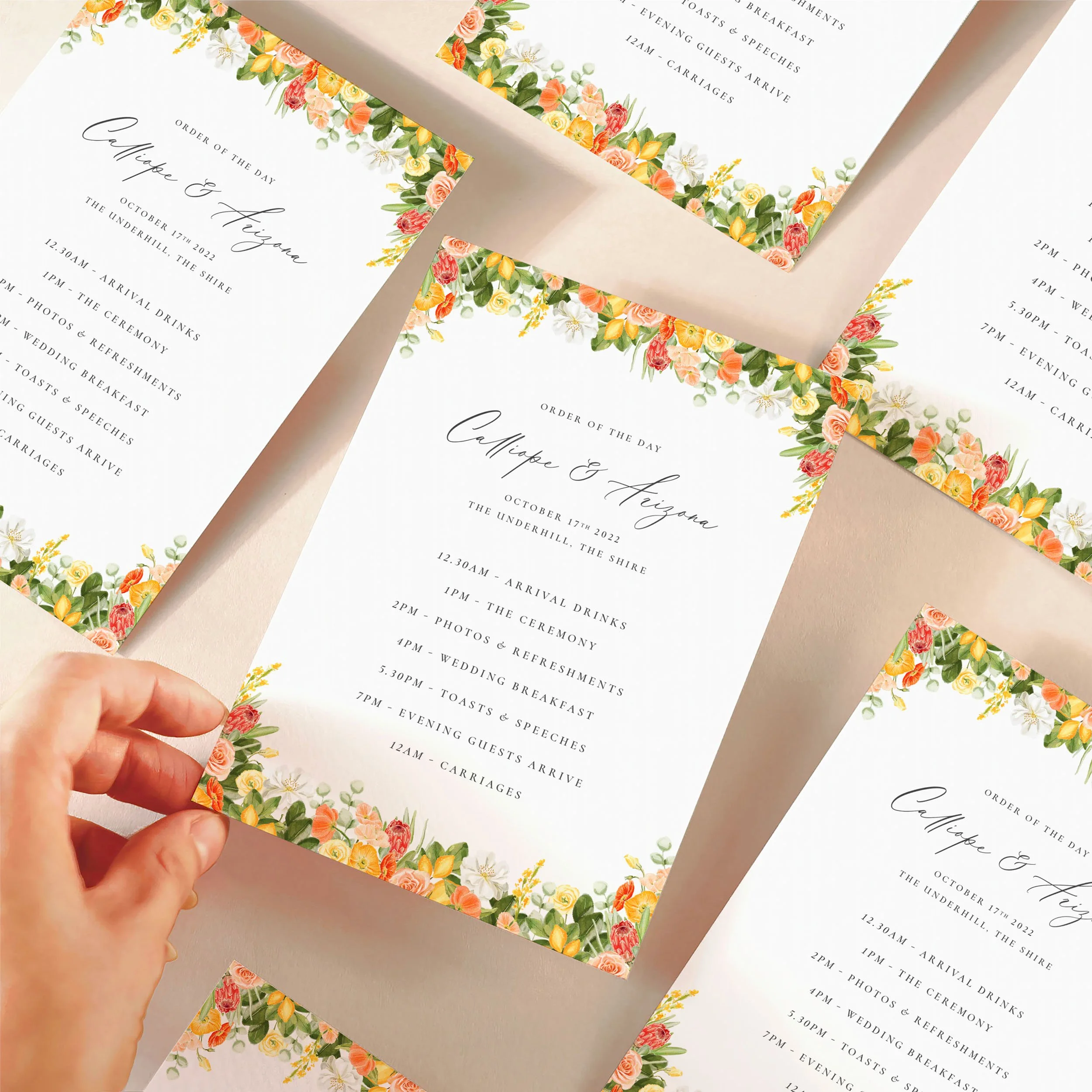 A hand picking up an order of the day timeline card with a bright yellow, orange and green design featuring small leamons