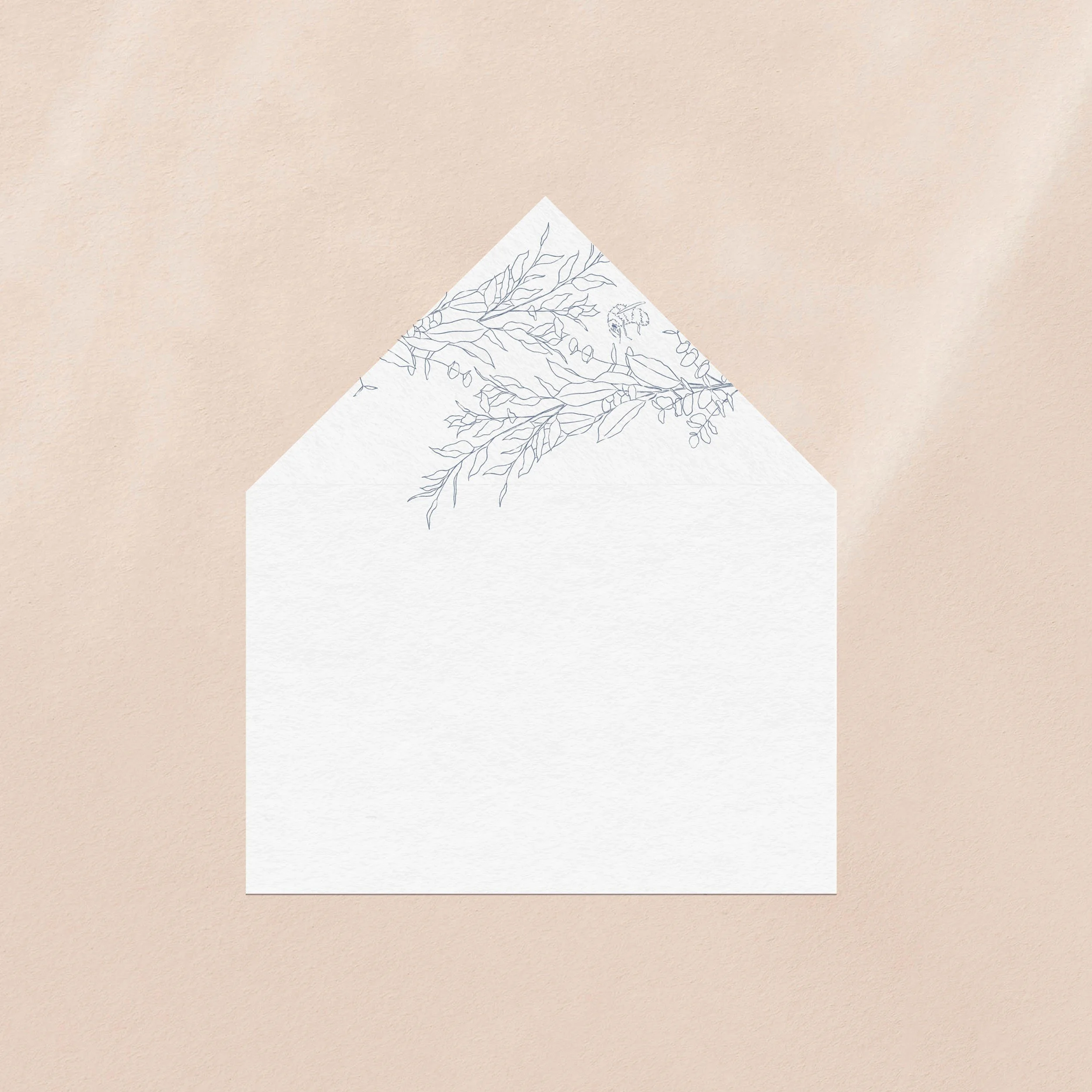 An envelope liner printed with a delicate hand-drawn motif featuring a bumble bee.