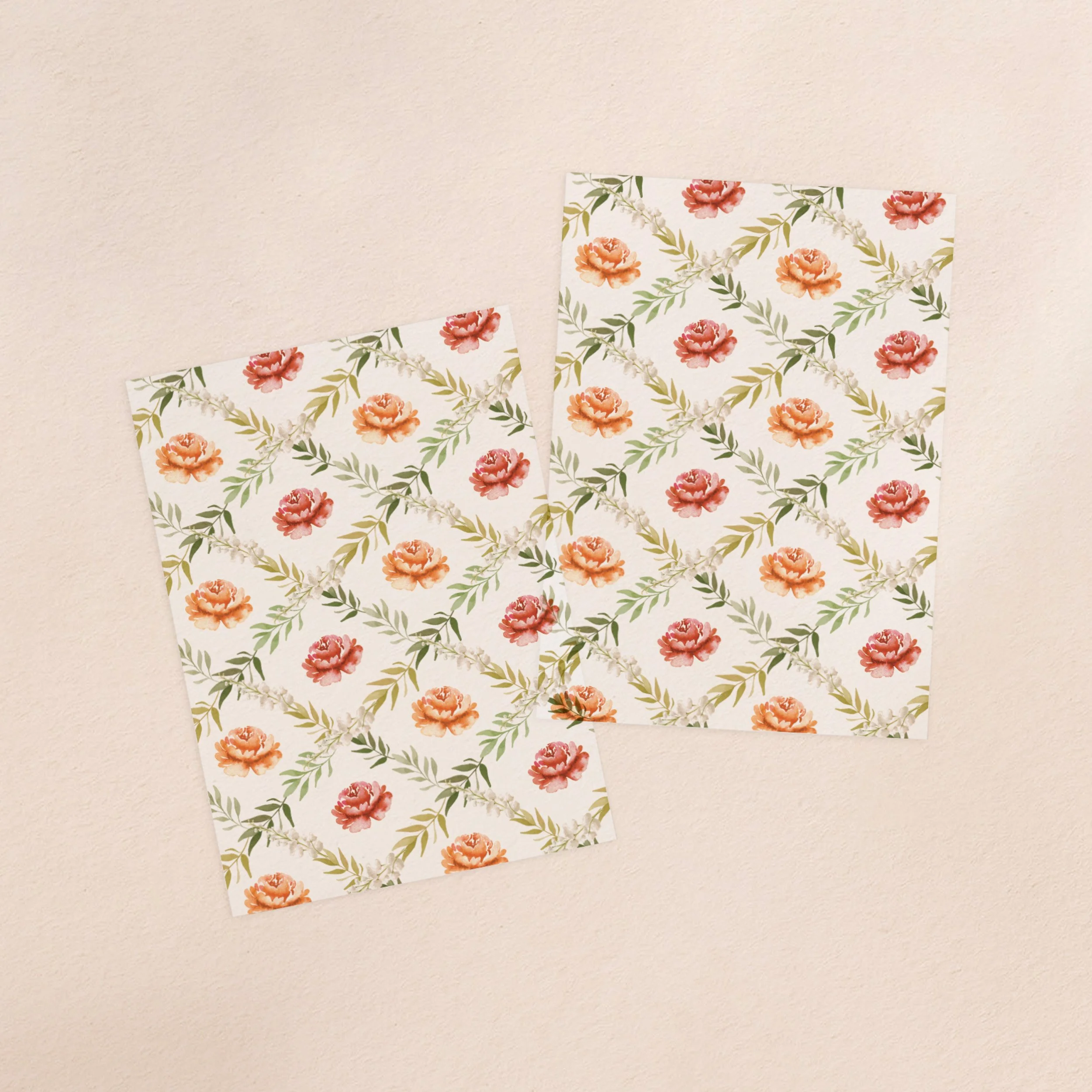 Two vellum paper overlay sheets with a burnt orange floral pattern design