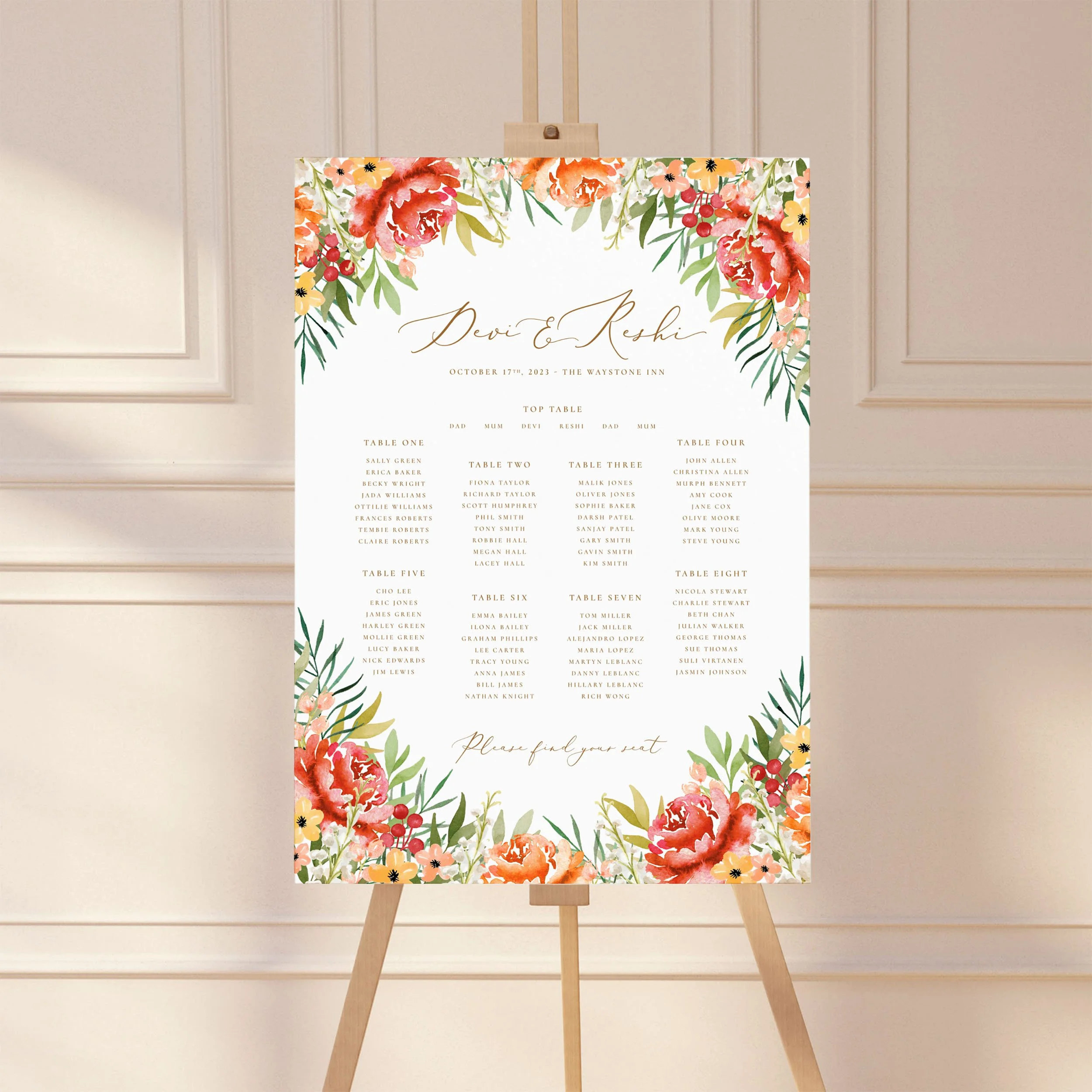 A wedding table plan sign printed on a large A1 board, standing on an easel. The design has watercolour florals in shades of orange, burgundy, yellow and green.