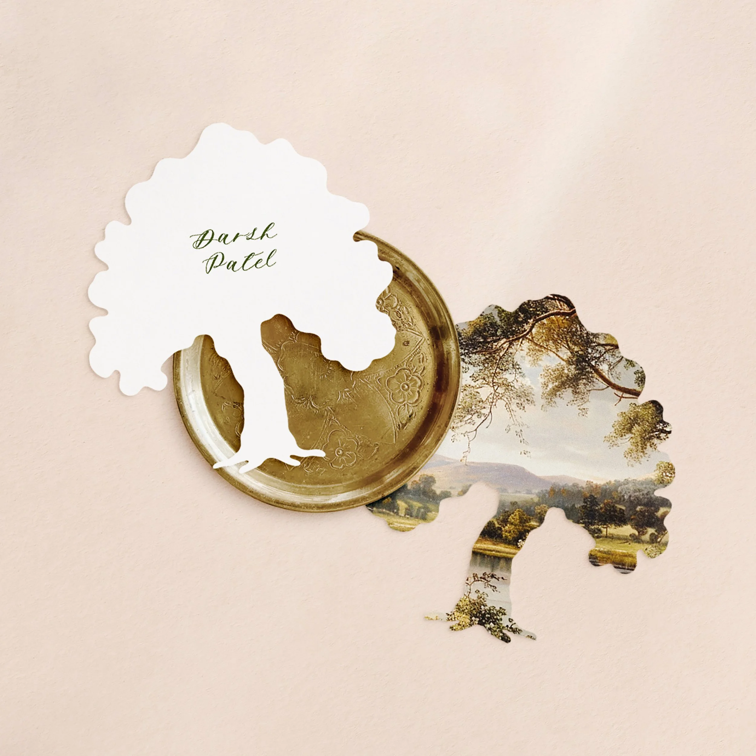 Two tree-shaped place cards with a landscape painting on one side and a different guest name printed on the back of each in green text.