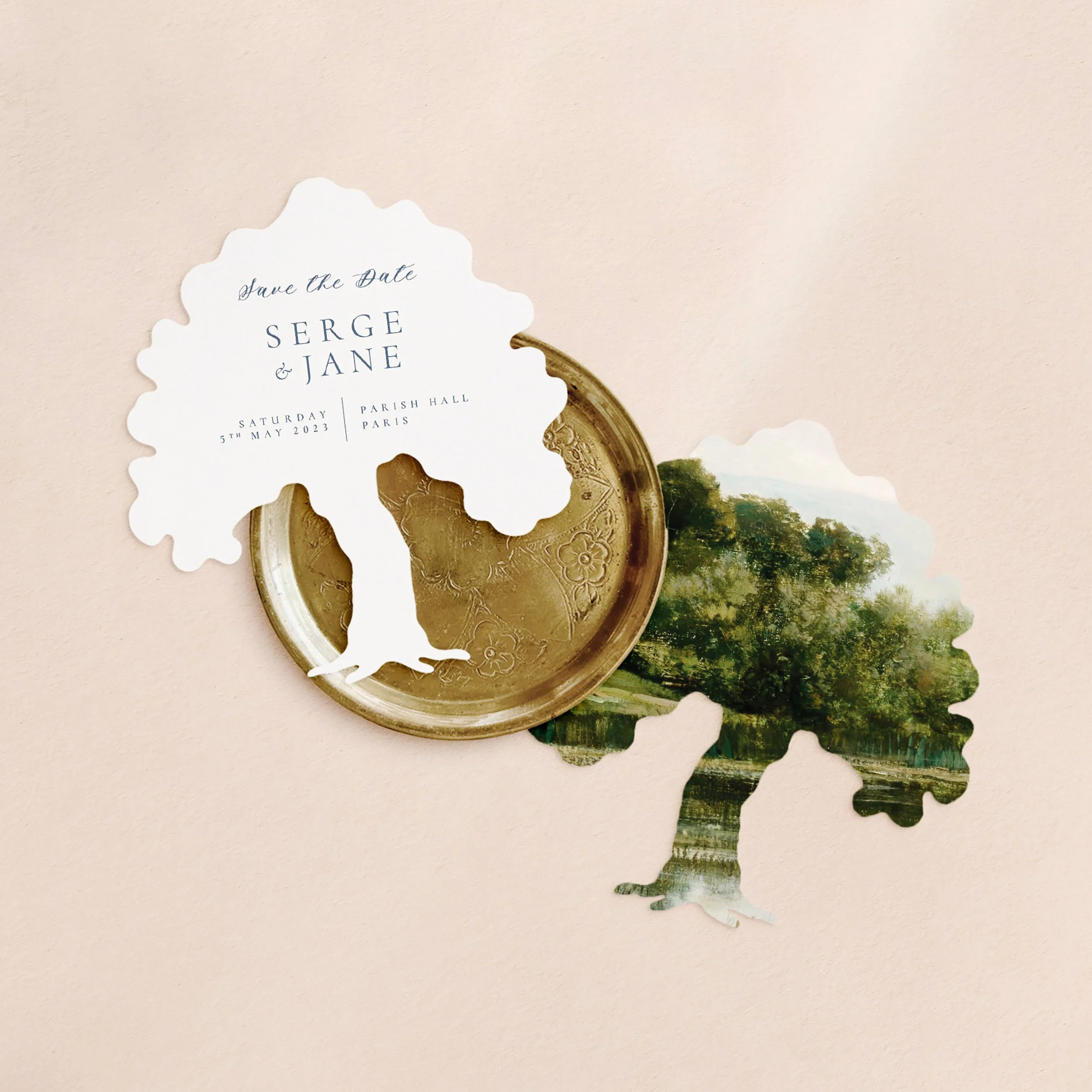 Two tree-shaped cards with a landscape painting on one side and wedding save the date wording in dusty blue text on the other.