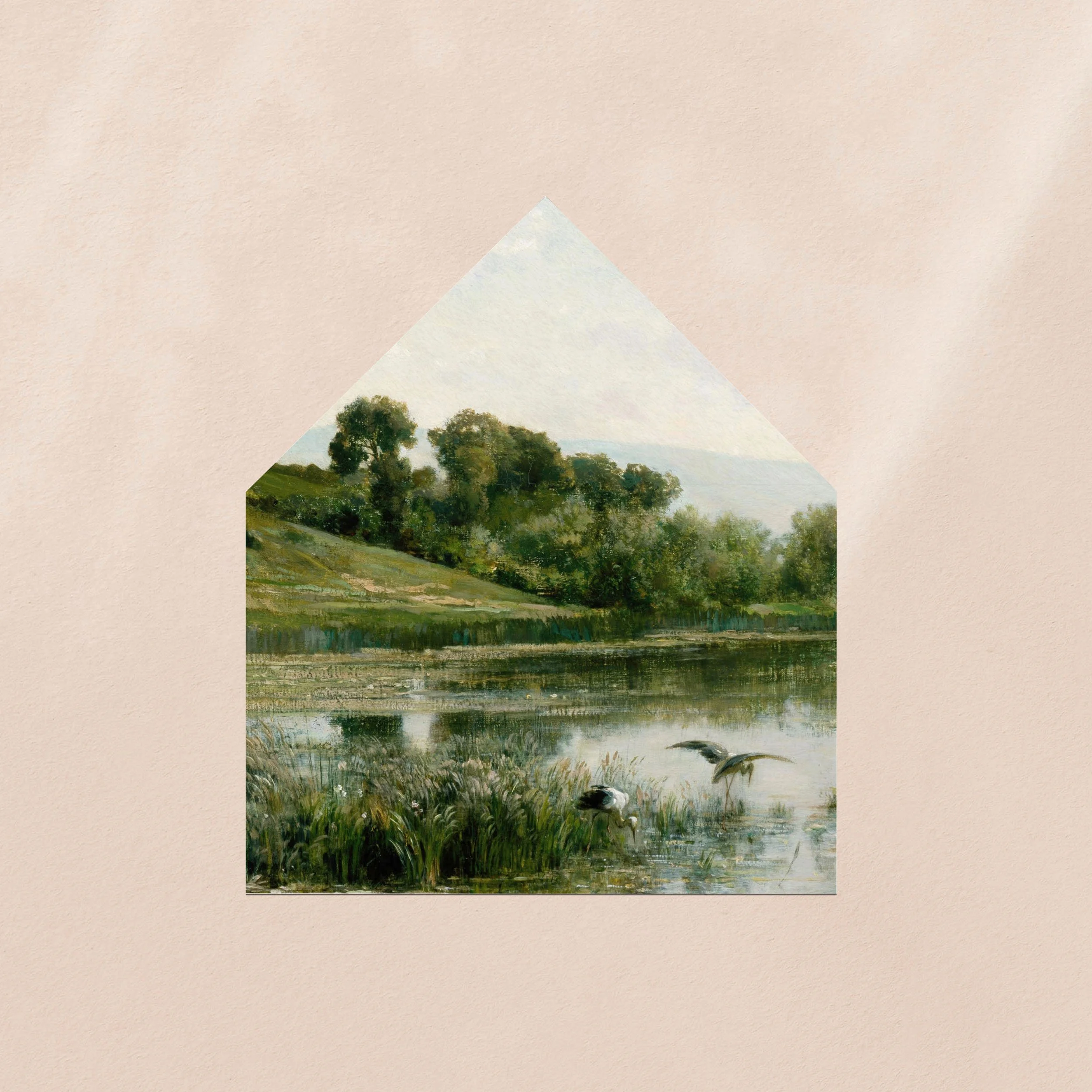 An envelope liner printed with a lush green landscape with a pond in the foreground