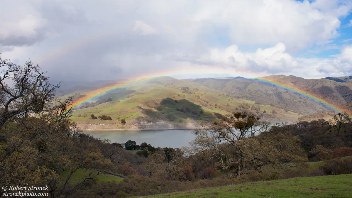   No. 10 / Calaveras Rainbow&nbsp; (Calaveras_RB51225) 
 Venturing out on a rainy day in late March paid off when the sun broke through cloudy skies and created this wonderful (double) rainbow over the Calaveras Reservoir in Alameda County.  