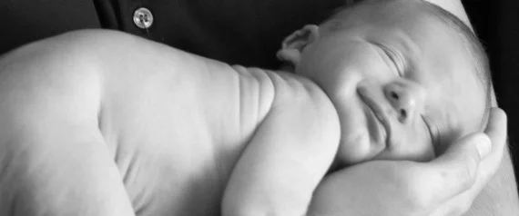 Baby Poops On Dad In Photo Shoot, Makes For Amazing Viral Moment