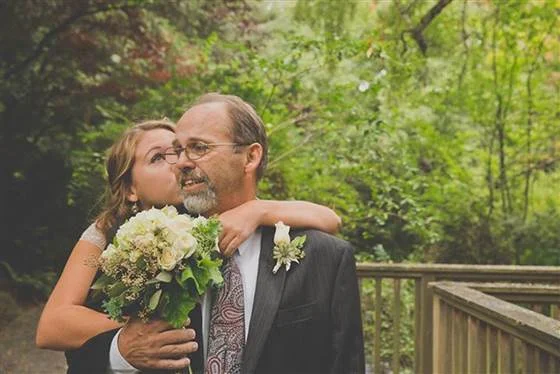 Evan Burgher In anticipation of her wedding day, Thea Henderson, 21, and her father, Frank, staged photos with her in a wedding dress and him in a suit. Frank was told in mid-September he may have only two weeks to live.