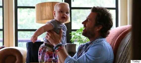 Blake Mycoskie and his 6-month-old son Summit