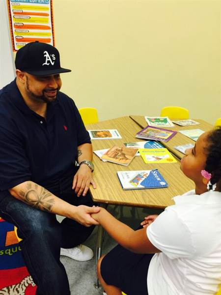 Khari Touré and his daughter Nia talk during the filming of the video. (Image: Khari Touré)