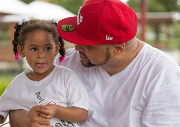 Khari Touré and his youngest daughter Maya share a moment.&nbsp;(Image:&nbsp;Khari Touré)