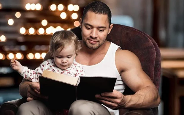 This child is so well behaved she appears to be sitting through a chapter of War and Peace. (Image: Alamy Stock Photo)