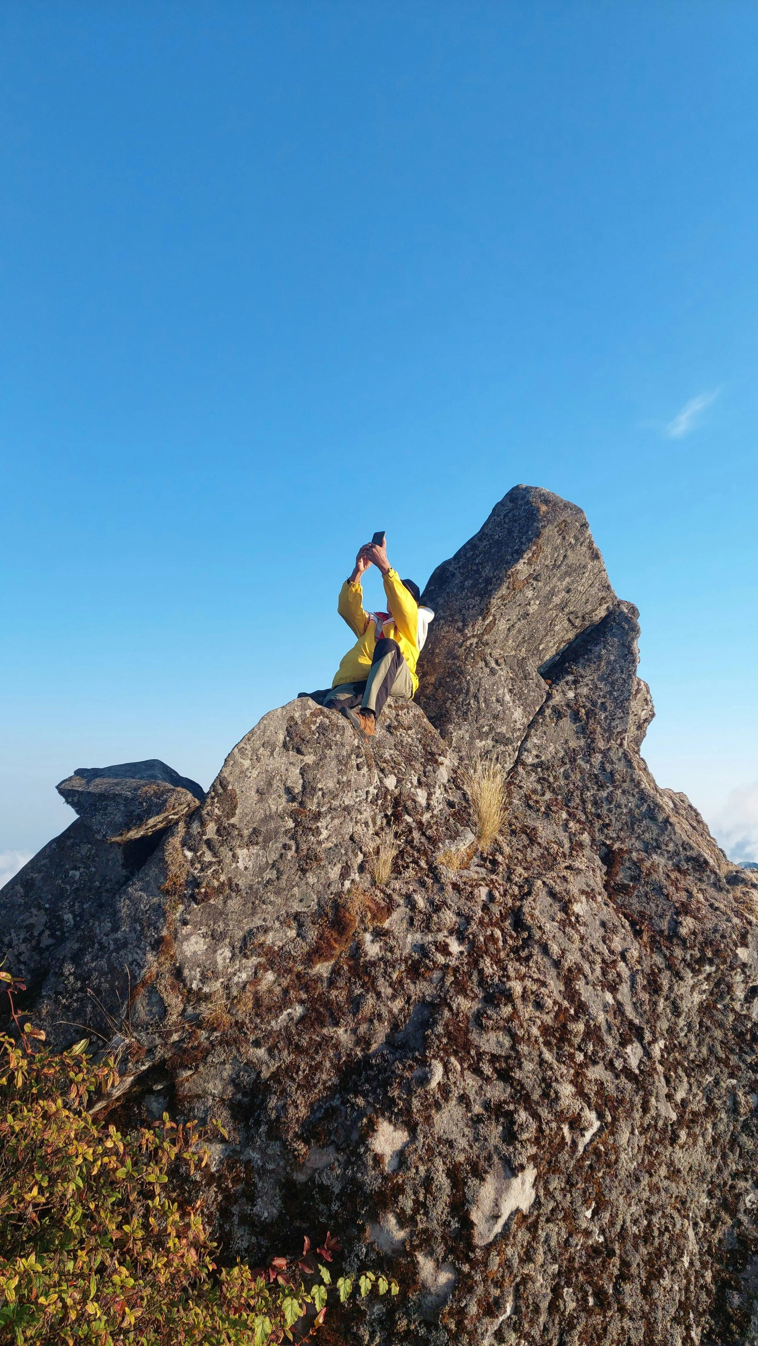 Climber Reaches Peak on Rocky Mountain