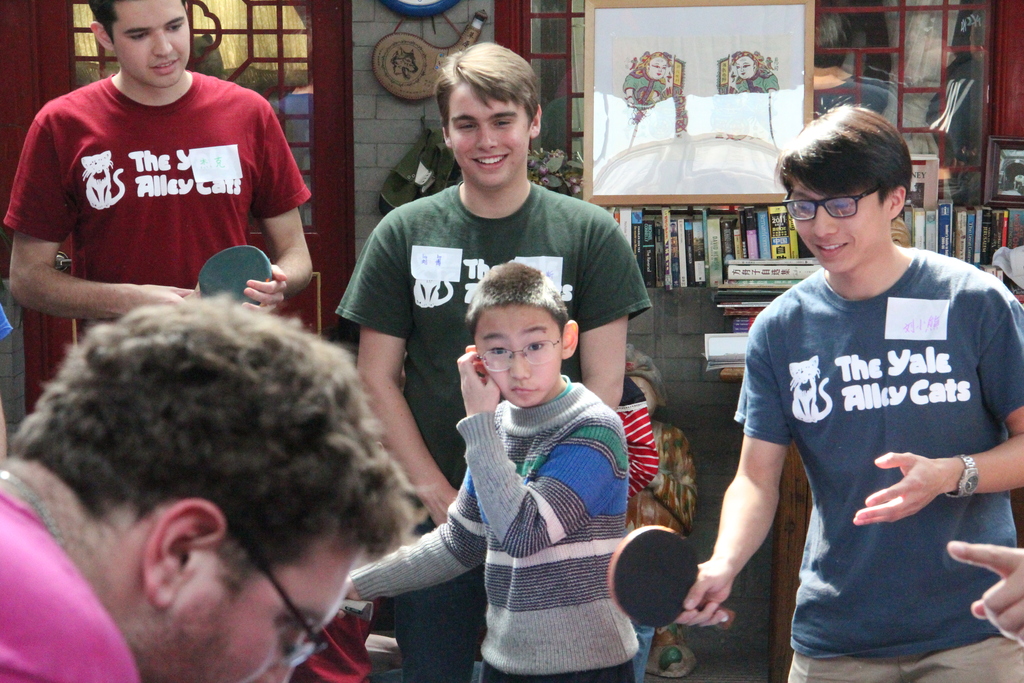 The Alley Cats play ping-pong with our new friends!