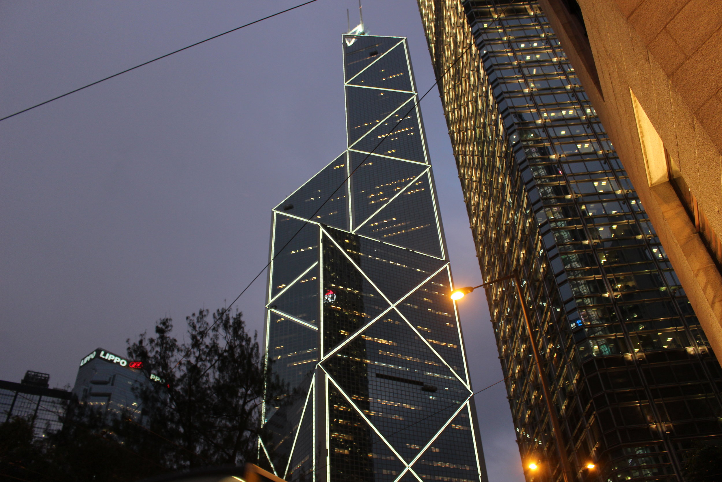  Walking past the Bank of China tower 