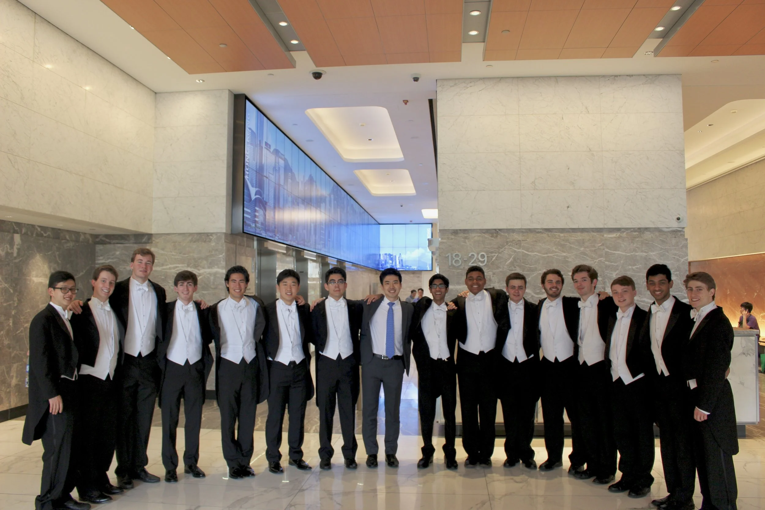 The Cats perform at J.P. Morgan Bank with alumnus Kyeong-Sik Seoung ('15)