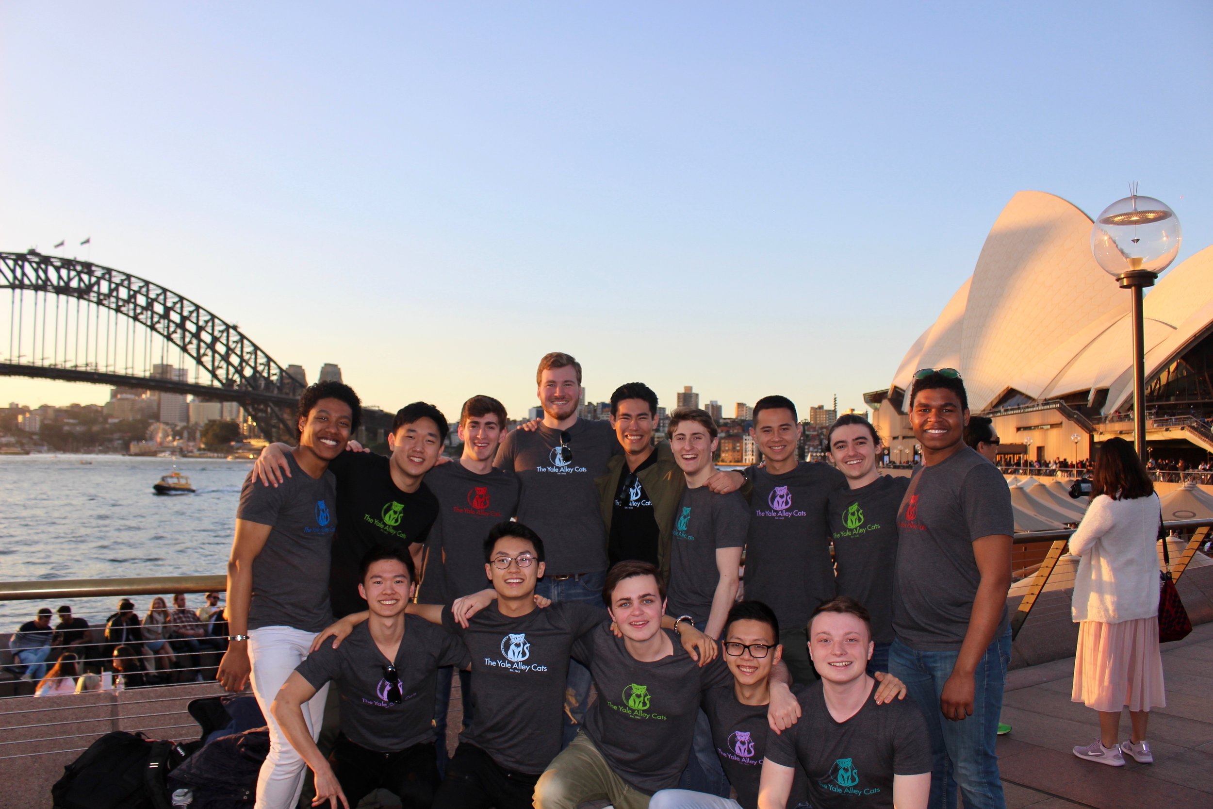  Group photo by the Sydney Opera House and Harbor Bridge 