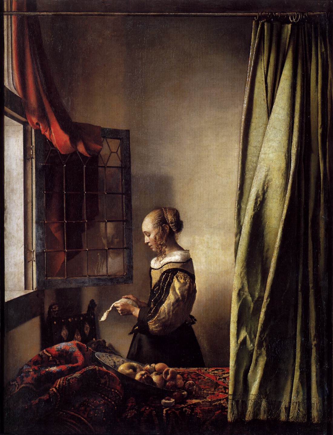 girl-reading-a-letter-at-an-open-window.jpg