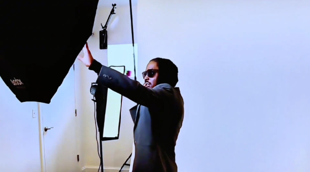 John Kind working with studio lighting during a John Kind Studios commercial production.
