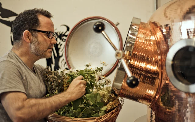 Glendalough+Distillery+adding+botanicals+to+still.jpg