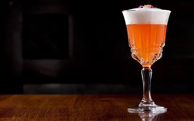 The Sloe Gin Fizz tastes as stunning as it looks