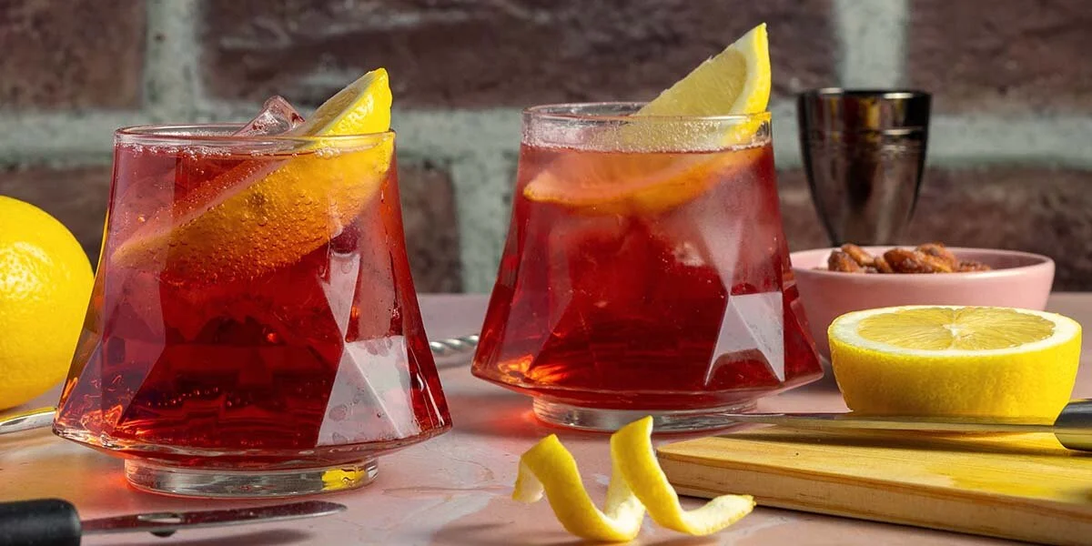 Enjoy a Cherry Bakewell Spritz cocktail with our ginspiked Cherry
